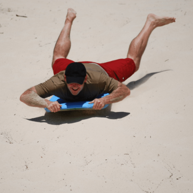 Boogie Board Down Sand Dunes at 90-Mile Beach