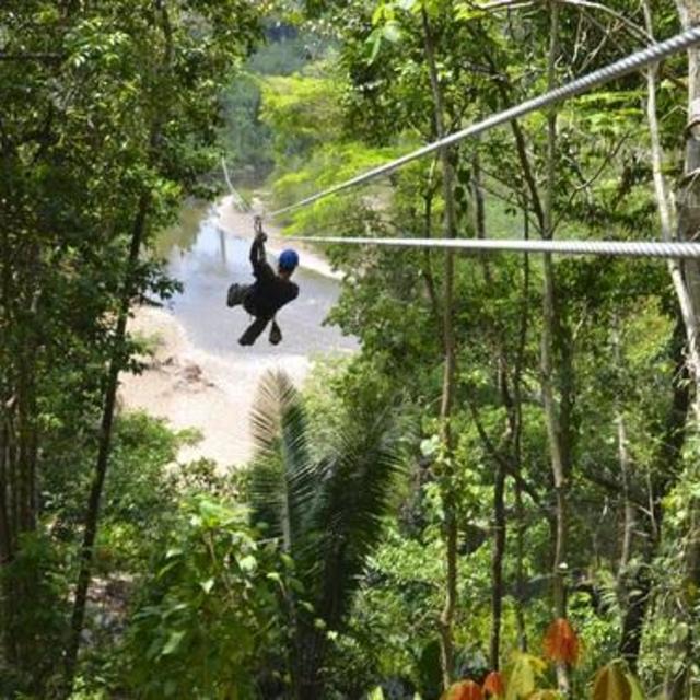 Zip lining through Belize