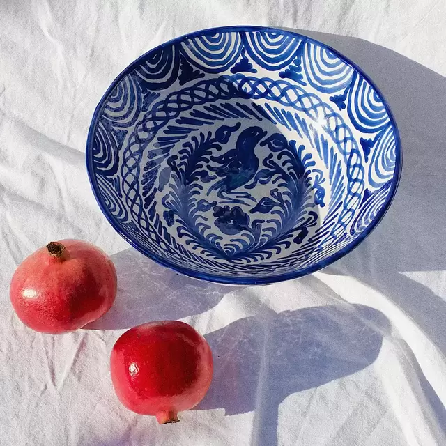 Large bowl with hand painted designs in Blue