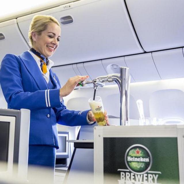 Buy us a drink on the plane