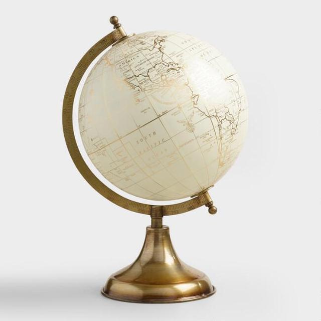 White Globe on Gold Stand