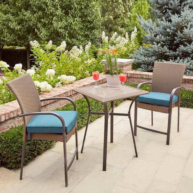 Corranade 3-Piece Wicker Balcony Height Outdoor Bistro Set with Charleston Cushions