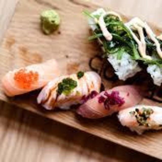 Help us eats lots and lots of sushi in Japan