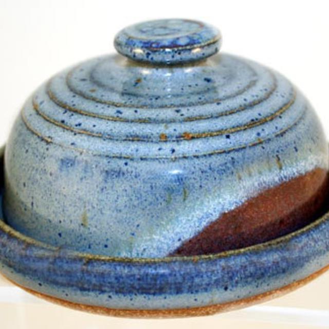 Stoneware covered butter dish. can be used for roasting garlic, and serving cheese or butter