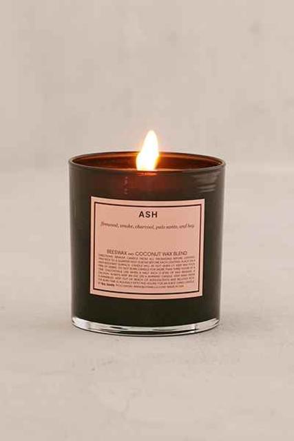 Boy Smells Candle