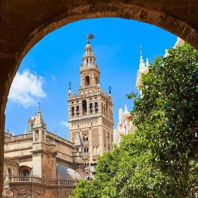 9-Hour Seville Sightseeing Tour with Guadalquivir River Boat Ride. Cathedral, & Alcazar of Seville Guided Tour