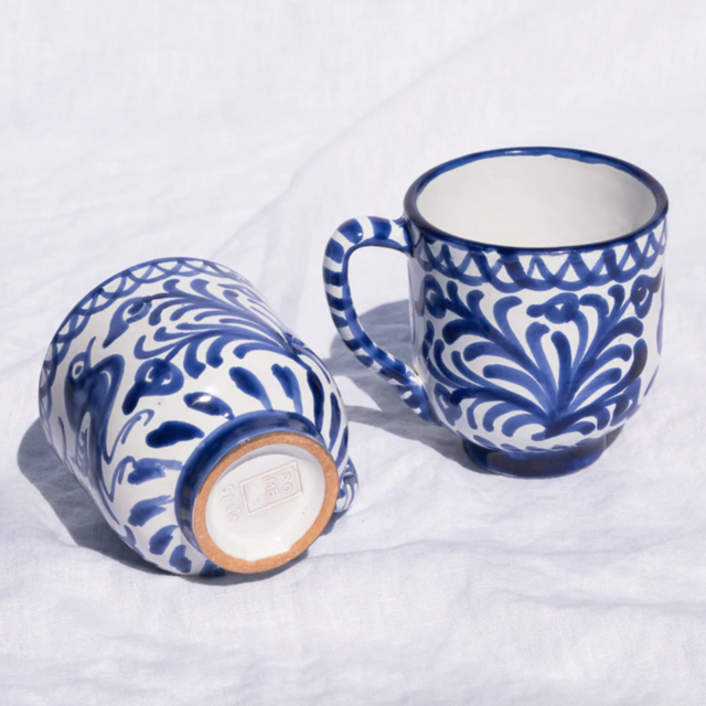 Mug with hand painted designs