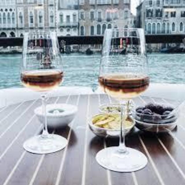 Champagne and antipasto overlooking the canal in Venice