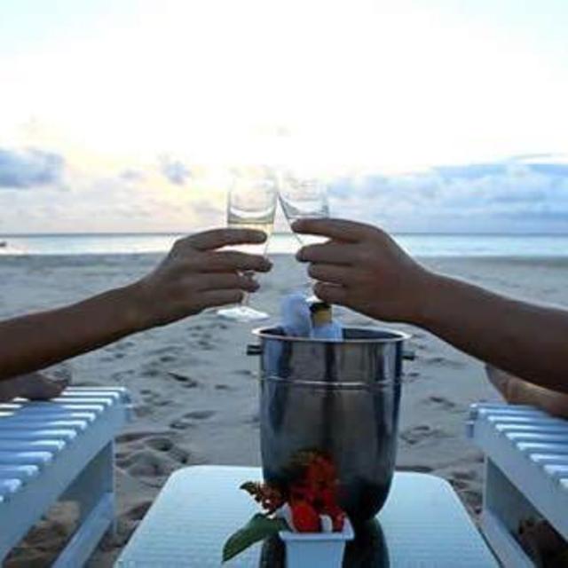 Champagne on the beach for sunset