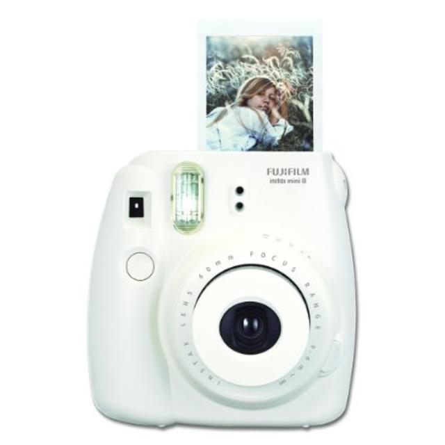 For our DIY wedding photobooth :): Fujifilm Instax Mini 8 Instant Film Camera (White) + 2 pack of film