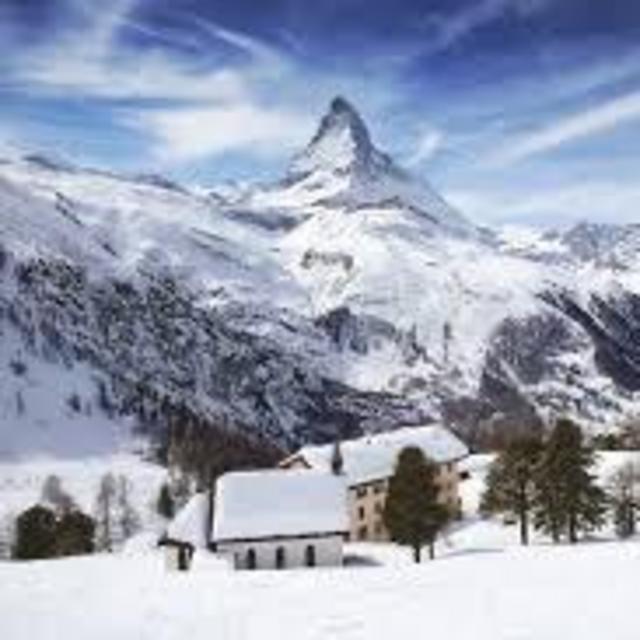Skiing in Swiss Alps **See Comments**