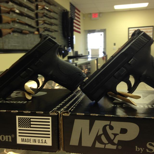 Pair of Smith & Wesson M&P®9 SHIELD™ Crimson Trace® Green Laserguard®