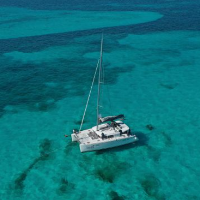 Isla Mujeres VIP Honeymoon Experience: Catamaran, Snorkel, Buffet & Drinks