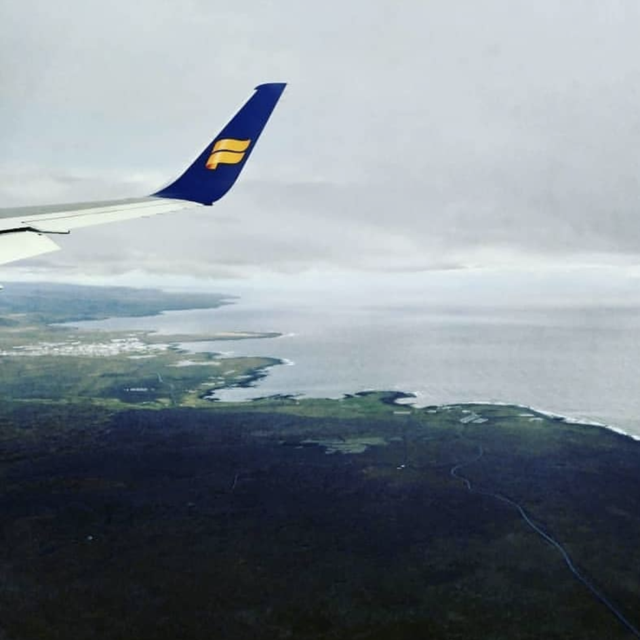 Upgrade to seats with extra leg room on our flight from DC to Iceland