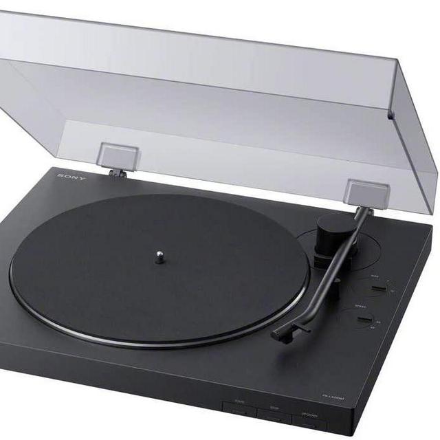 New turntable (cause our current one is old and crappy and scratching our records)
