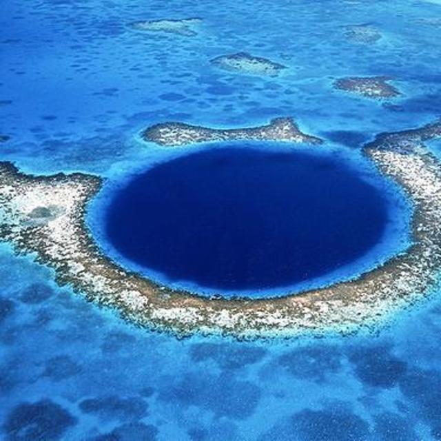 Helicopter tour of the Blue Hole at Lighthouse Reef