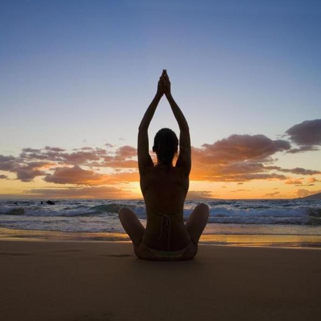 Guided meditation and yoga on the beach