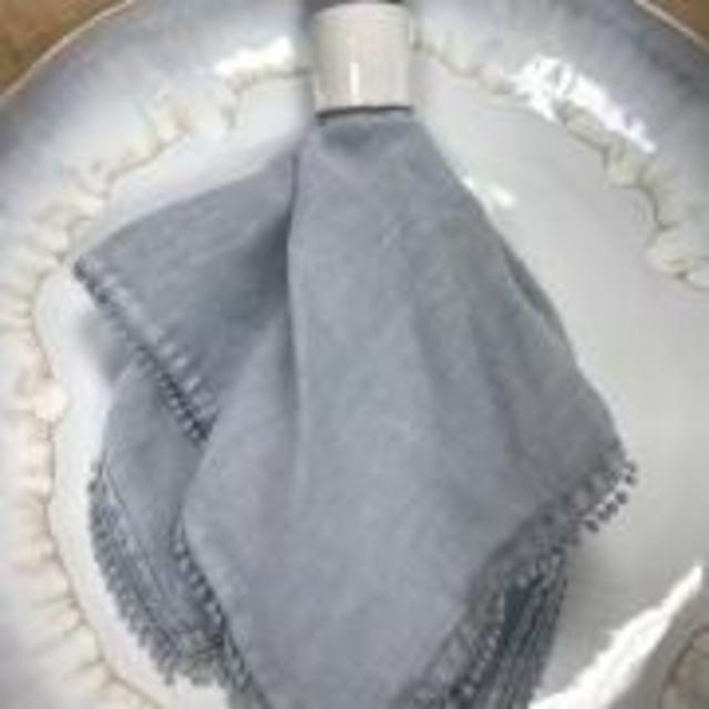 Saro Designs ~ Napkin Pom Pom LC Blue, Price $16.00 in Germantown, TN from Two Doors Down