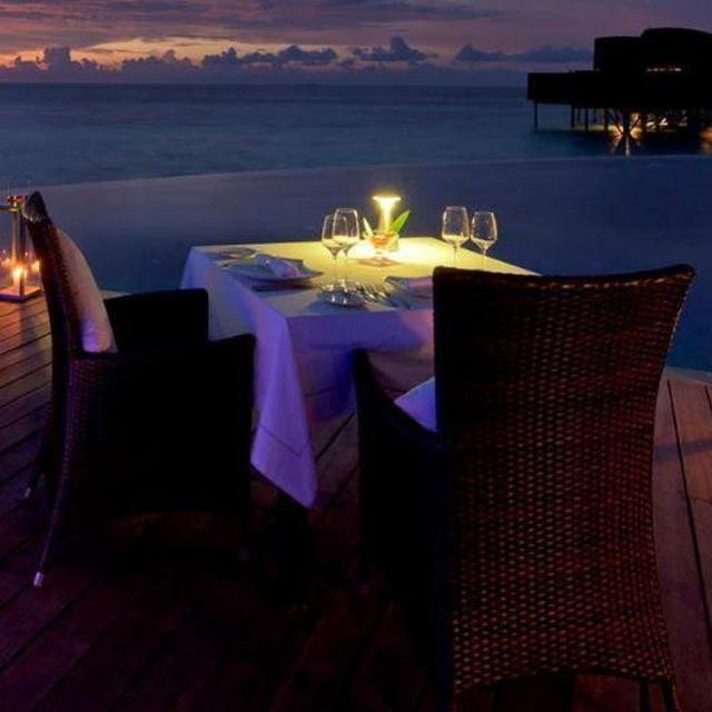 Romantic candlelight dinner on the beach