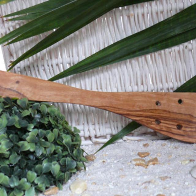 Spatula with holes in olive wood