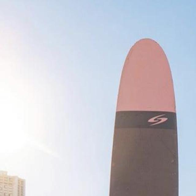 Couple Surfing Lesson