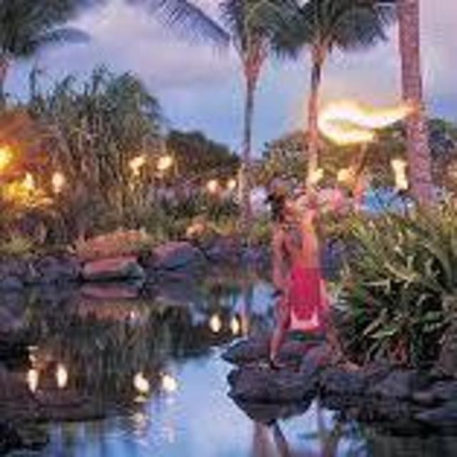 experience a traditional Hawaiian luau in Kauai