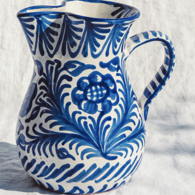 Medium pitcher with hand painted designs