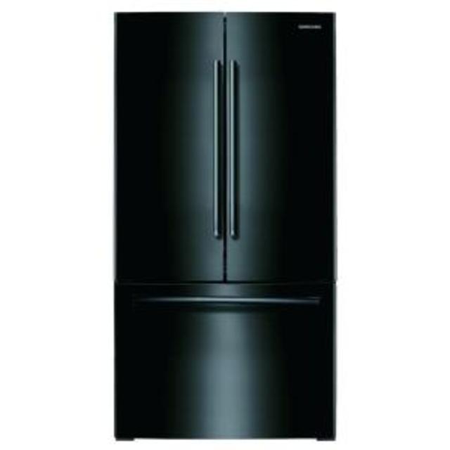 Refrigerator with large vegetable drawers and a freezer