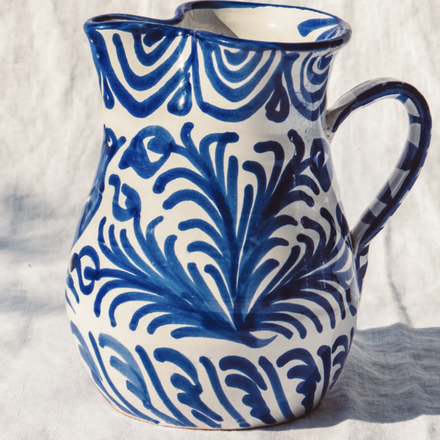 Small pitcher with hand painted designs