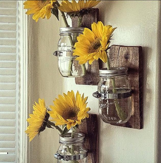 3 Country Style Wall Vases: Cottage Chic Mason jar hanging wall vase attached to an awesome colorful piece of pallet wood.