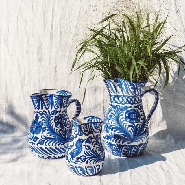 Medium pitcher with hand painted designs