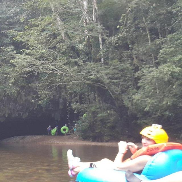 Cave tubing and zip lining adventure tour